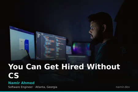 Clean desk setup with monitors and code for an article by Atlanta based Software Engineer, Namir Ahmed.